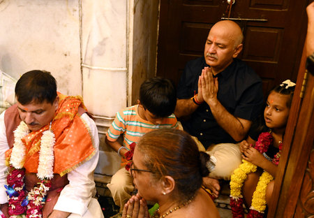 NEW DELHI, INDIA - AUGUST 10: Former Delhi Deputy Chief Minister and Aam Aadmi Party (AAP) leader Manish Sisodia offering prayer at Hanuman Temple at Connaught Place after he was granted bail in the Delhi Excise Policy case by the Supreme Court, on Augustのeditorial素材