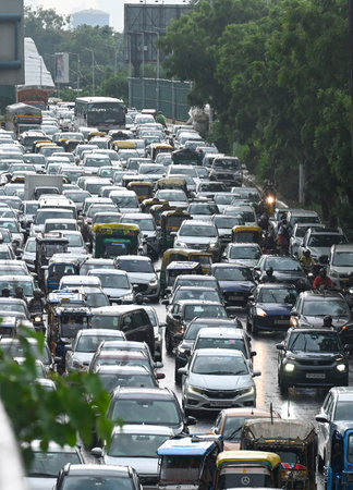 NOIDA, INDIA - AUGUST 11: A view of traffic Jam in sector 38A road due to rainfall, on August 11,...