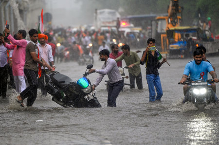 NEW DELHI, INDIA - AUGUST 11: A Bike has broken down on a waterlogged stretch near Vinod Nagar on August 11, 2024 in New Delhi, India. (Photo by Ajay Aggarwal/Hindustan Times )のeditorial素材