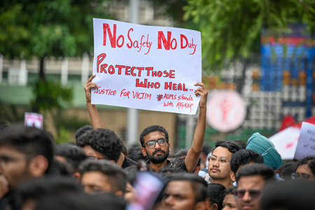 NEW DELHI, INDIA - AUGUST 12: Doctors from AIIMS Delhi stage a protest against the alleged Kolkata Doctor Rape case  on August 12, 2024 in New Delhi, India. Doctors in Delhi, Mumbai, Kolkata and several other cities have announced that all elective servicのeditorial素材