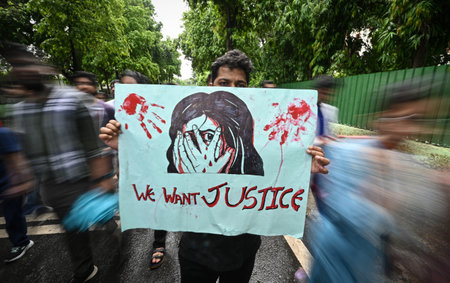 NEW DELHI, INDIA - AUGUST 13: Doctors from AIIMS Delhi stage a protest against the alleged Kolkata Doctor Rape case on August 13, 2024 in New Delhi, India. Patients Suffer as OPD services at government hospitals hit due to doctors strike. The protest comeのeditorial素材