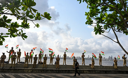 MUMBAI, INDIA - AUGUST 14: 1000 NCC cadets form a human chain at Nariman Point to Marine drive in Mumbai holding the National flag to commemorate the spirit of Har Ghar Tiranga ahead of India's Independence Day celebrations on August 14, 2024 in Mumbai, Iのeditorial素材