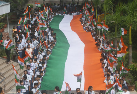 NEW DELHI, INDIA - AUGUST 14: Students of Vidya Bal Bhavan participate in Tranga Yatra, The tricolor...