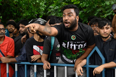 KOLKATA, INDIA - AUGUST 18: Football fans of two main club Mohun Bagan SG, East Bengal FC stage protest near Salt lake Stadium over alleged rape and murder of a trainee doctor at RG Kar Medical College & Hospital on August 18, 2024 in Kolkata, India. (Phoのeditorial素材