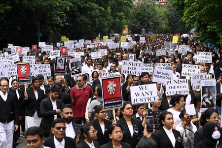KOLKATA, INDIA - AUGUST 19: Advocates of Calcutta High Court take out a protest rally over alleged rape and murder of a trainee doctor at RG Kar Medical College & Hospital, on August 19, 2024 in Kolkata, India. (Photo by Samir Jana/Hindustan Times )のeditorial素材
