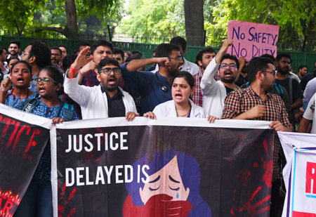 NEW DELHI, INDIA - AUGUST 19: Doctors stage a protest in front of Nirman Bhawan against the brutal...