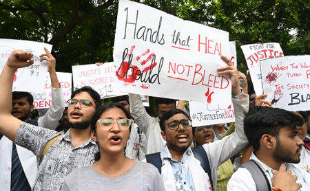 NEW DELHI, INDIA - AUGUST 19: Resident Doctors shout slogans protesting in front of Health Ministry...