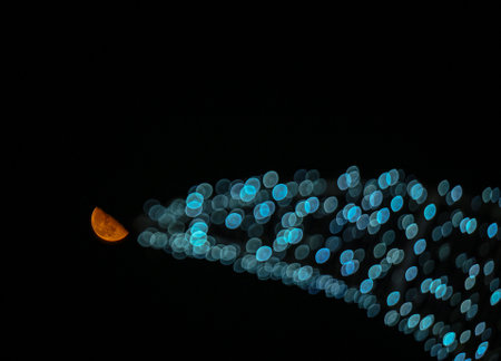 NOIDA, INDIA - AUGUST 25: The third quarter moon was seen from Noida on Sunday night on August 25, 2024 in Noida, India. The third quarter moon occurs when the opposite half of the moon is illuminated compared to the first quarter. The third or last quartのeditorial素材