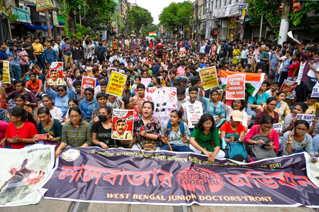 KOLKATA, INDIA - SEPTEMBER 2: Junior doctors along with other medical professionals from different...