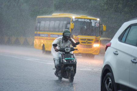 GURUGRAM, INDIA - SEPTEMBER 4 2024  Commuter travel on the Sohna Elevated Expressway amid heavy rains near Air Force Station, on September 4, 2024 in Gurugram, India. Delhi-NCR residents witnessed a sudden change in weather as heavy rain lashed several paのeditorial素材