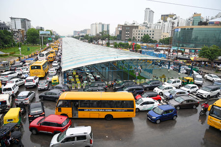 GURUGRAM, INDIA - SEPTEMBER 4 2024  School buses stuck in traffic congestion at Gurugram-Sohna road...