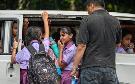 NEW DELHI, INDIA - SEPTEMBER 9 2024  Students on their way during the Rain at KG Marg , on September 9, 2024 in New Delhi, India. (Photo by Raj K Raj/Hindustan Times )のeditorial素材
