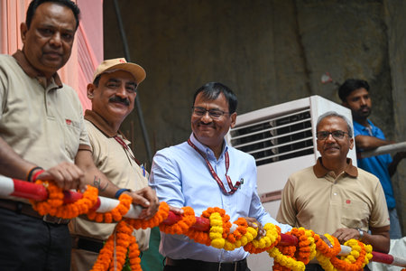 NEW DELHIINDIA SEPTEMBER 18 2024 Dharmendra Delhis Chief Secretary along with DMRC Chief Vikas Kumar seen during an event of DMRC for Twin Tunnel breakthroughs of TBMs Bhoomi and Srishti which is a part of Phase 4 at Pulbangash Metro Station on September のeditorial素材