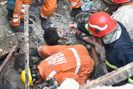 NEW DELHIINDIA SEPTEMBER 18 2024 NDRF and fire fitter Team Rescuse a Man at a Building Collpsed at...