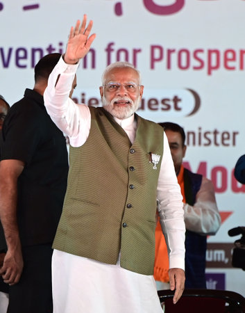 SRINAGAR INDIA SEPTEMBER 19 2024 Prime Minister Narendra Modi waves towards the crowd as he arrives...