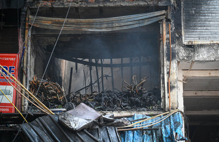 NEW DELHI, INDIA - SEPTEMBER 21: Fire fighters seen trying to douse off fire gutted inside a furniture shop last night at Nabi Karim, Paharganj, on September 21, 2024 in New Delhi, India. (Photo by Sanchit Khanna/Hindustan Times )のeditorial素材