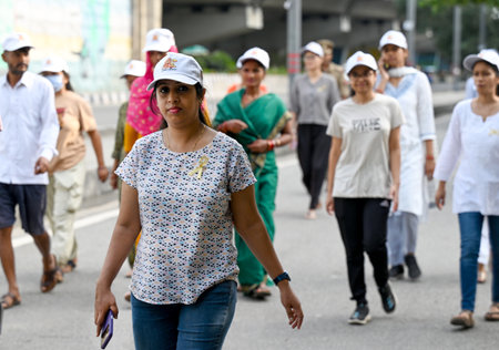 NOIDA, INDIA - SEPTEMBER 28: Doctors, nursing staff and patient's parents participate in a 3 km walkathon from Child PGI Sector 30 to spread awareness about childhood cancer, on September 28, 2024 in Noida, India. (Photo by Sunil Ghosh/Hindustan Times )のeditorial素材