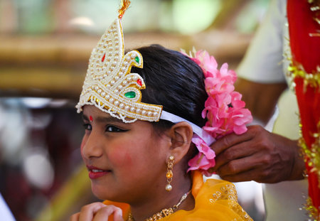 NOIDA, INDIA - SEPTEMBER 28: Makeup artist preparing artists during the preparation of Shobha Yatra...