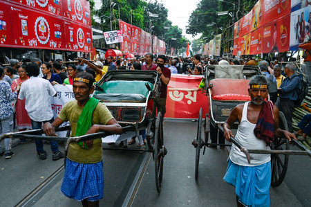 KOLKATA INDIA OCTOBER 1 2024 Junior doctors activists and rickshaw pullers participate in the...