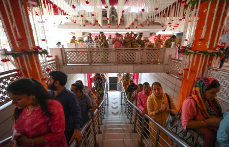 NEW DELHI INDIA OCTOBER 3 2024 Devotees seen offering prayers on the first day of Navratri Festival...