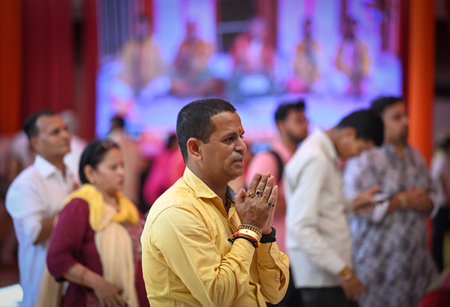 NEW DELHI INDIA OCTOBER 3 2024 Devotees seen offering prayers on the first day of Navratri Festival...