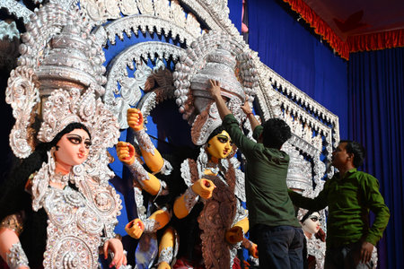 NEW DELHI, INDIA - OCTOBER 7: Artist form Kolkata decorated Durga idol on the occasion of Durga Puja...