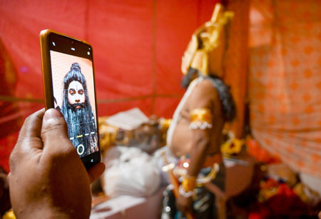 NOIDA, INDIA - OCTOBER 4: Ramlila artists doing makeup and waiting for their performance in the...