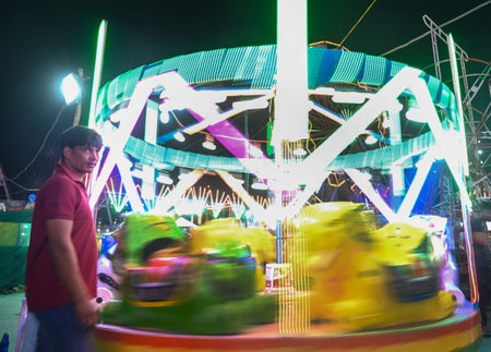 NOIDA, INDIA - OCTOBER 5: A view of the fair held at Ramlila Ground in Sector 21A. people enjoying themselves on giant wheels, circus and big swings on October 5, 2024 in Noida, India. (Photo by Sunil Ghosh/Hindustan Times)のeditorial素材