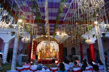 GURUGRAM, INDIA - OCTOBER 9: Devotees offer prayer to Goddess Durga during the Durga Puja festival at DLF phase-5 club, on October 9, 2024 in Gurugram, India. (Photo by Parveen Kumar/Hindustan Times )のeditorial素材