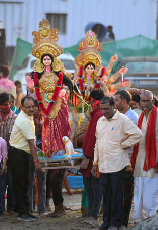 NOIDA, INDIA - OCTOBER 12: Devotees immersed the idols of Sherawali Mata on the last day of Navratri...