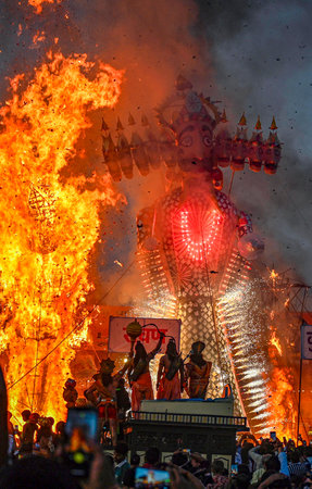NEW DELHI, INDIA - OCTOBER 12: An effigy of demon king Ravana goes up in flames marking the end of Dussehra festival at Shri Dharmik Leela Committee, Red Fort, on October 12, 2024 in New Delhi, India. Dussehra, also known as Vijayadashami, is one of the mのeditorial素材