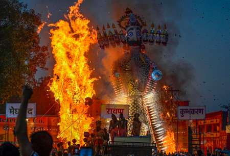 NEW DELHI, INDIA - OCTOBER 12: An effigy of demon king Ravana goes up in flames marking the end of Dussehra festival at Shri Dharmik Leela Committee, Red Fort, on October 12, 2024 in New Delhi, India. Dussehra, also known as Vijayadashami, is one of the mのeditorial素材
