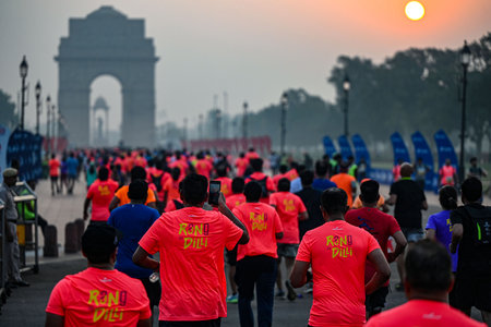 NEW DELHI, INDIA - OCTOBER 20: Participants participate during the 19th edition of Vedanta Delhi Half Marathon 2024 at Kartavya Path, on October 20, 2024 in New Delhi, India. The marathon, which started at Jawaharlal Nehru Stadium, saw around 36,000 compeのeditorial素材