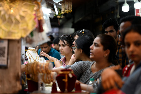 NEW DELHI, INDIA - OCTOBER 19: Women are seen for shopping on the eve of 'Karvachauth', at Lajpat...