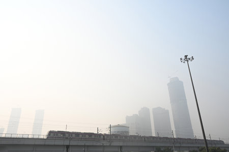NOIDA, INDIA - OCTOBER 22:   A view of skyscrapers covered in a light haze due to rising air...