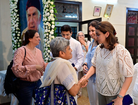 MUMBAI, INDIA - OCTOBER 27: Maya and Leah, niece of Indian industrialist Ratan Tata, share a light moment with people attending the condolence meeting organized for Ratan Tata at Rustom baug, Byculla, on October 27, 2024 in Mumbai, India. (Photo by Anshumのeditorial素材