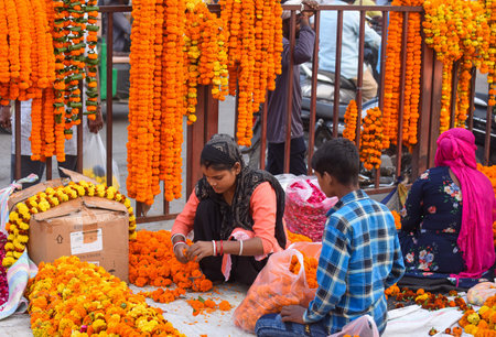 GURUGRAM INDIA OCTOBER 30 2024 People are buying different types of flowers for puja and decoration...