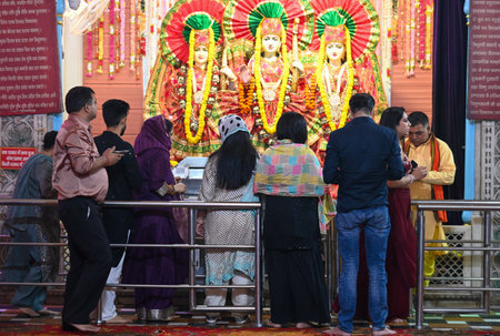 NOIDA, INDIA - OCTOBER 31: People offer prayers at a temple on the occasion of Diwali at Sanatan...