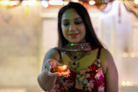 NOIDA, INDIA - OCTOBER 31: People offer prayers at a temple on the occasion of Diwali at Sanatan Dharm Mandir at Sector 19 on Thursday Night, on October 31, 2024 in Noida, India. (Photo by Sunil Ghosh/Hindustan Times )のeditorial素材