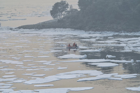 NEW DELHI INDIA NOVEMBER 4 2024 NDRF personnel searching for the body of a man feared dead after...