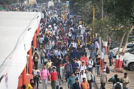 NEW DELHI INDIA NOVEMBER 5 2024 Crowds of People arrives to board the trains to reach their...