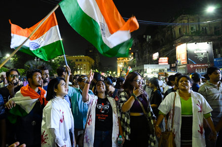 KOLKATA INDIA NOVEMBER 9 2024 Junior doctors and social activists shout slogans during a rally...