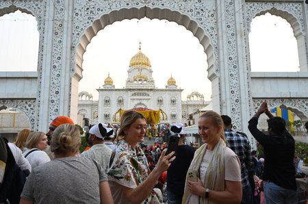 NEW DELHI, INDIA - NOVEMBER 15: Devotees visit Bangla Sahib Gurudwara on the occasion of Gurpurab - 555th birth anniversary of Guru Nanak Dev, on November 15, 2024 in New Delhi, India. Gurpurab, also known as Guru Nanak Prakash Utsav or Guru Nanak Jayantiのeditorial素材