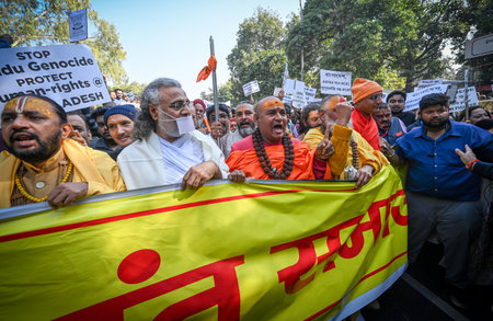 NEW DELHI INDIA DECEMBER 10 2024 Members from Civil Society of Delhi along with various other social organizations seen during a protest march towards Bangladesh Embassy against the alleged attacks on minorities in Bangladesh at Teen Murti Marg on Decembeのeditorial素材