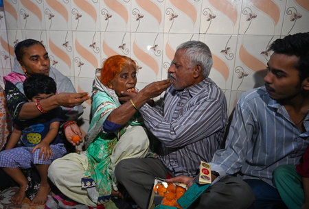 MUMBAI INDIA DECEMBER 18 2024 Hamida Banu a 75 year old resident of Kurla reunited with her family after 23 years on December 18 2024 in Mumbai India In 2002 Hamida Banu left India after a recruitment agent promised her a cooking job in Dubai Instead she のeditorial素材