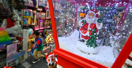 NEW DELHI INDIA DECEMBER 24 2024 People Shopping Fancy decoration items on the eve of Christmas celebrations at Khan Market on December 24 2024 in New Delhi India Photo by Raj K Raj Hindustan Timesのeditorial素材