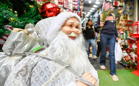 NEW DELHI INDIA DECEMBER 24 2024 People Shopping Fancy decoration items on the eve of Christmas celebrations at Khan Market on December 24 2024 in New Delhi India Photo by Raj K Raj Hindustan Timesのeditorial素材