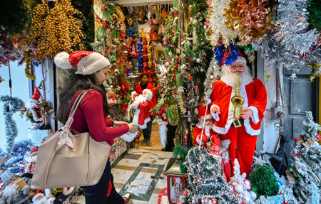 NEW DELHI INDIA DECEMBER 24 2024 People Shopping Fancy decoration items on the eve of Christmas celebrations at Khan Market on December 24 2024 in New Delhi India Photo by Raj K Raj Hindustan Timesのeditorial素材
