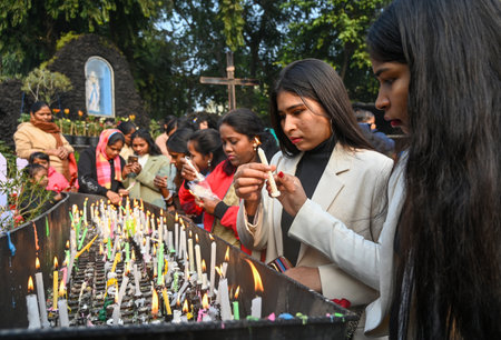 NOIDA, INDIA - DECEMBER 25: Devotees offer prayers inside a St. Mary's church at Sector 34 on the...