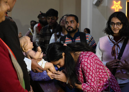 NEW DELHI, INDIA - DECEMBER 25: Devotees offering prayer at the Sacred Heart Cathedral Church on the occasion of Christmas, at Gole Dak Khana on December 25, 2024 in New Delhi, India. (Photo by Arvind Yadav/Hindustan Times )のeditorial素材